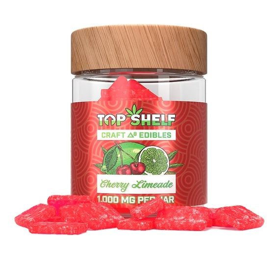 Cherry Limeade Delta-8 Edibles 1000mg Jar featuring red-colored gummies with a cherry and lime flavor design, placed beside the jar.