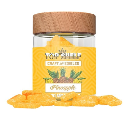 Pineapple Delta-8 Edibles 1000mg Jar with vibrant yellow gummies and tropical pineapple flavor, showing the jar with a clear view of the fruit-flavored gummies.