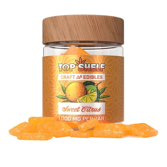 Sweet Citrus Delta-8 Edibles 1000mg Jar showcasing orange-colored gummies, with a citrus fruit flavor design on the label.
